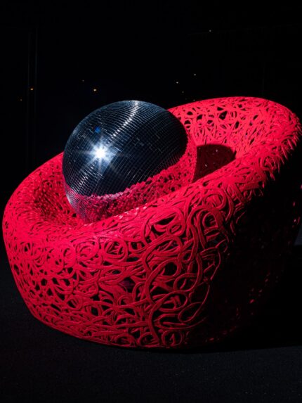 Minimalist matte-pink Dusk Chair with architectural silhouette.